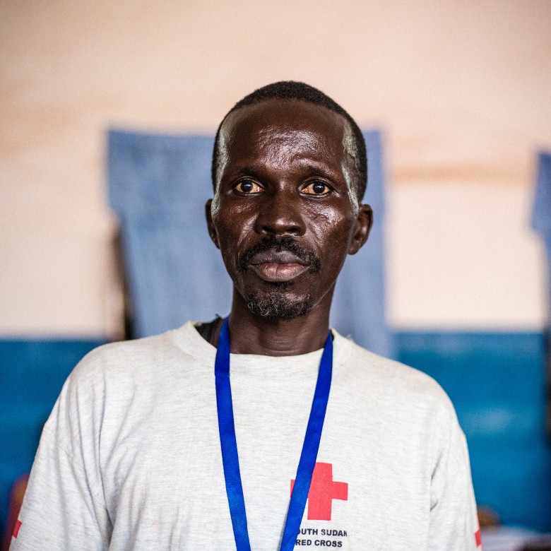 Amin is providing first aid at the Red Cross clinic. 