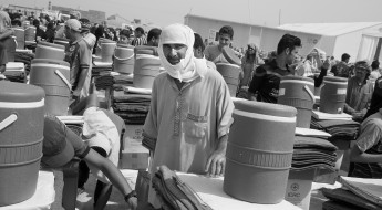 Photo gallery: In Iraq, aid distribution continues as further displacement looms