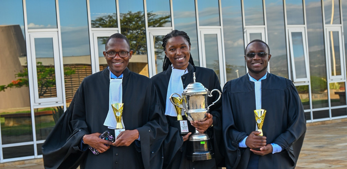University of Dodomo holding the winner trophies at the All Africa IHL competition