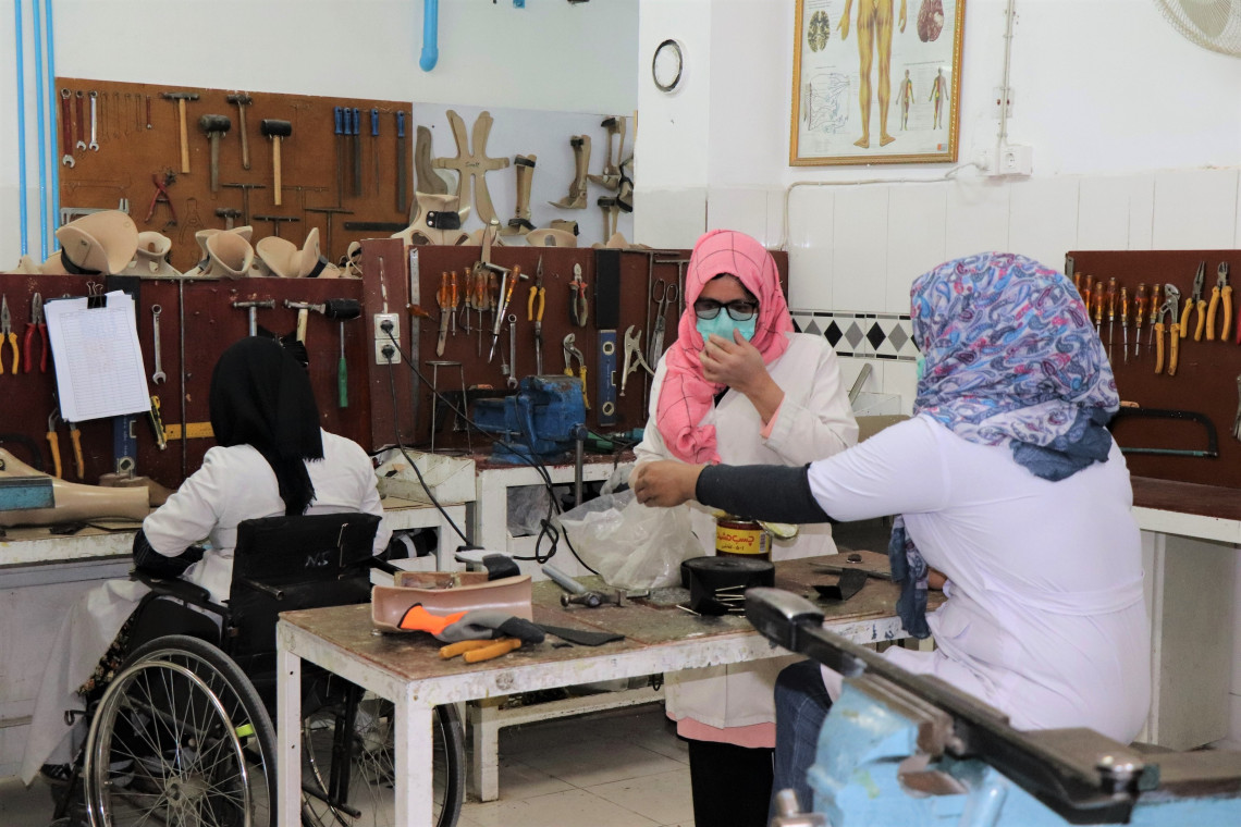 Staff at the ICRC’s orthopaedic centre in Kabul assembling parts for prosthetic limbs. Photo: Mohammad Masoud Samimi / ICRC
