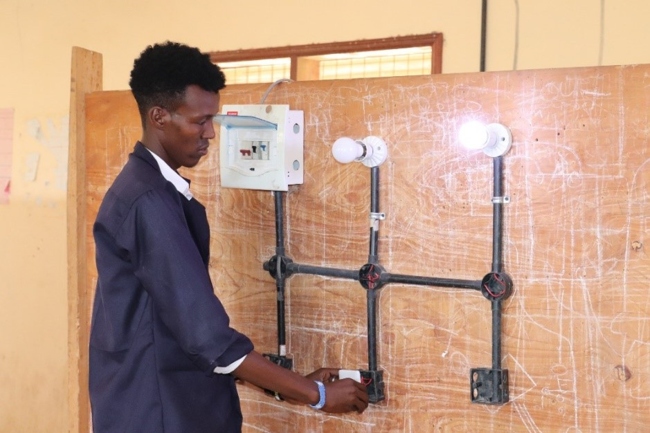 Ahmed Sila working on one of his electrical projects at the Garissa Vocational Training Centre