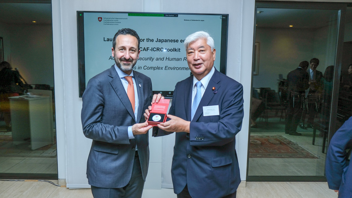 Director-general of the ICRC Robert Mardini with special adviser to the Prime Minister Gen Nakatani.