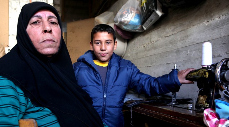 Syria crisis, Winter. Nadia and her grandson Yazan iving in an unfinished building in Kessweh, rural Damascus.